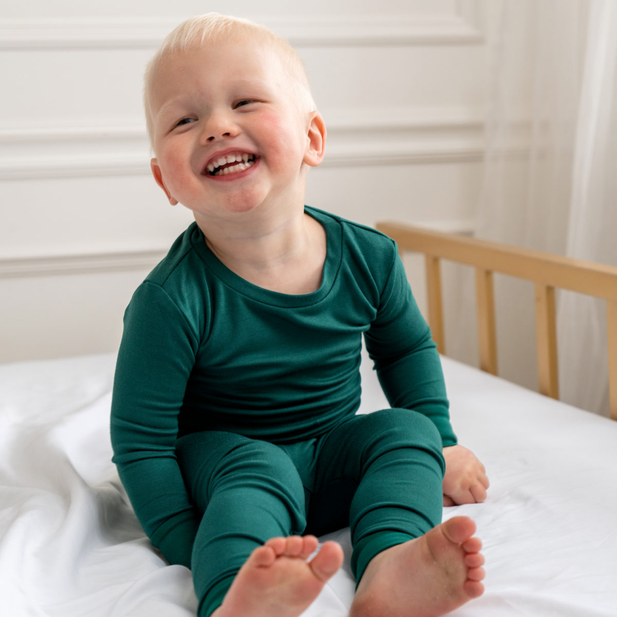 Green pajama set on a white background