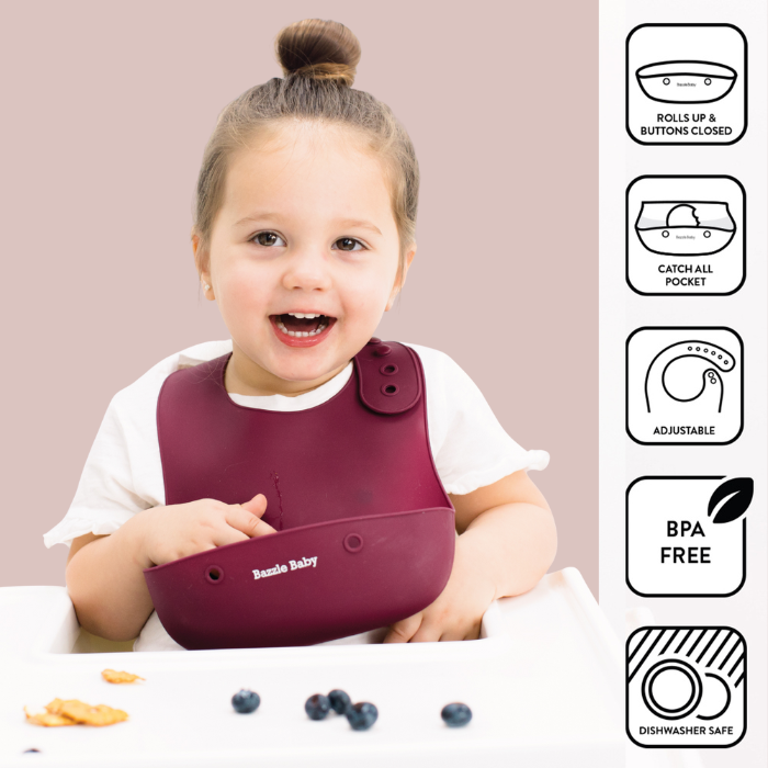 2 - pack of silicone baby bibs with food catching pocket in pink and cranberry.