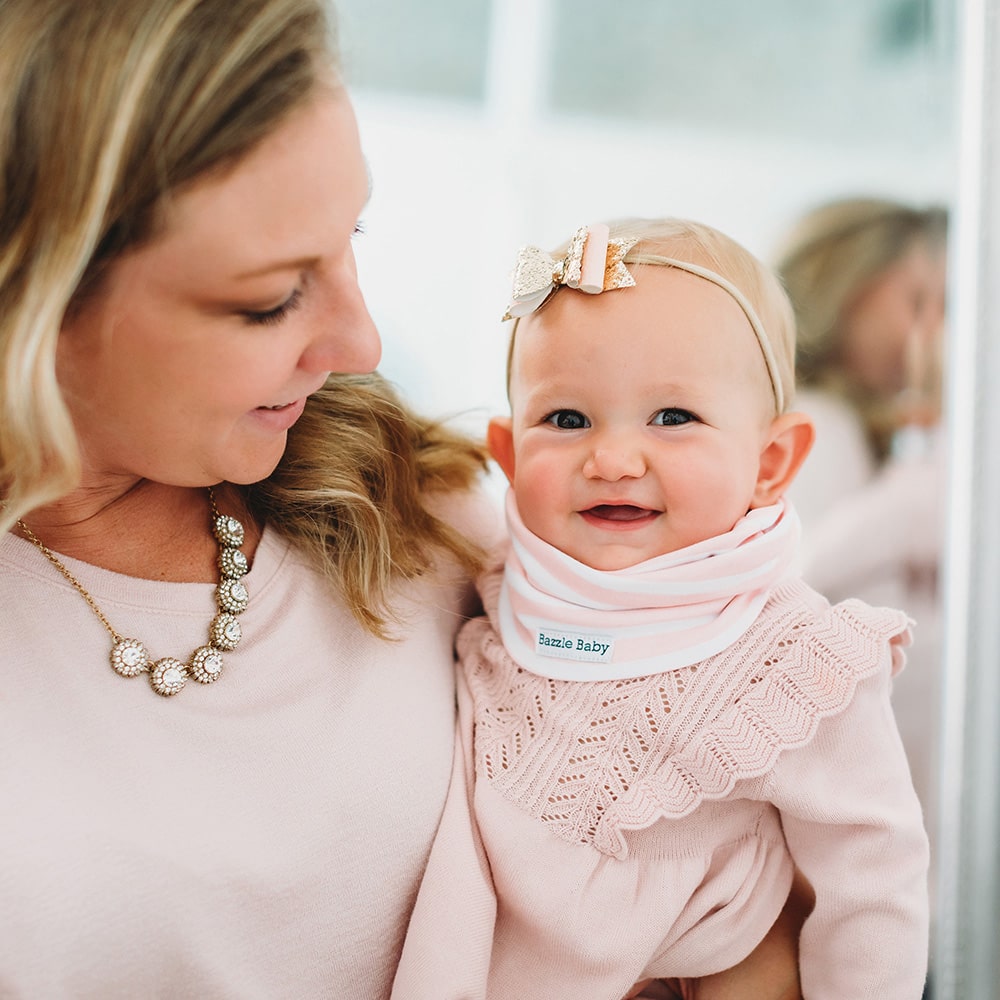 Wavy hearts and lines pink and white baby infinity scarf style drool bibs.