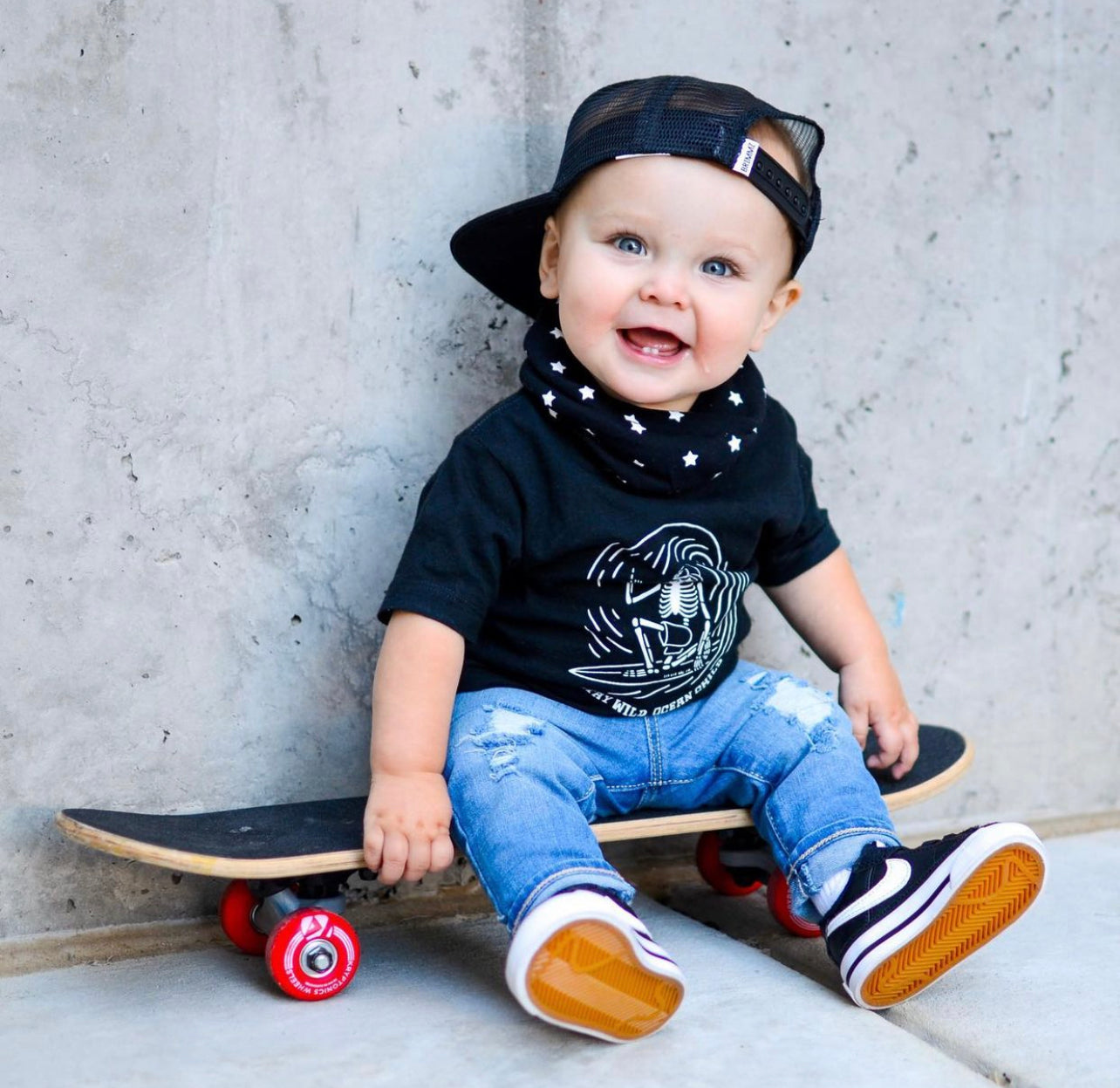 Bazzle Baby BandoBib in pen lines and black and white stars.
