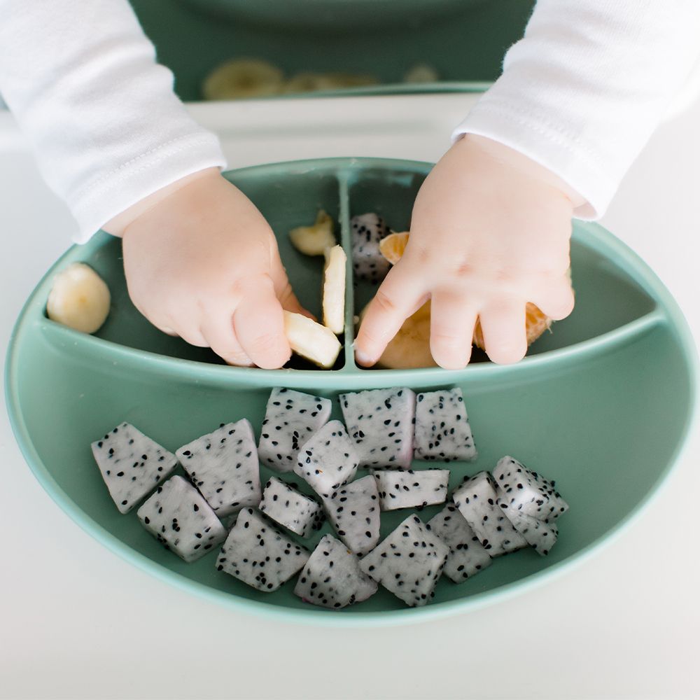 Bazzle Baby Anchor Silicone Plate in sage. Suctions to flat surfaces to not fall or slip.